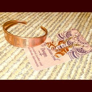 Matching leather earrings and bracelet